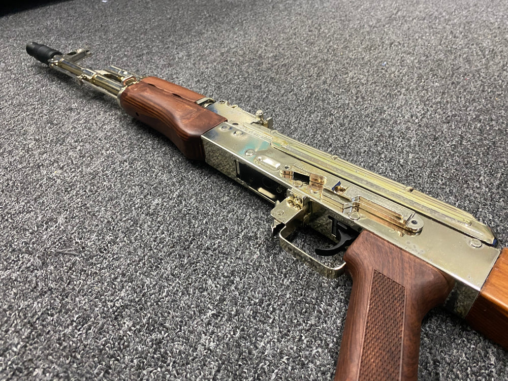 
                  
                    مسدس جل بمؤخرة خشبية بلون فضي مزدوج من نوع AK
                  
                